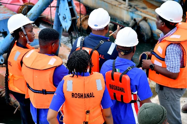 Roshanal crew in life jackets on site